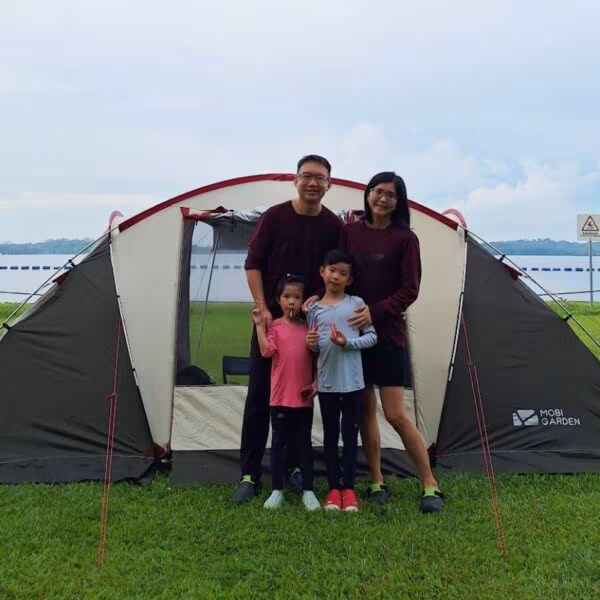 Family camping near a lake.5